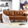 Elegancka, nowoczesna sofa dwuosobowa z nitowanym wzorem